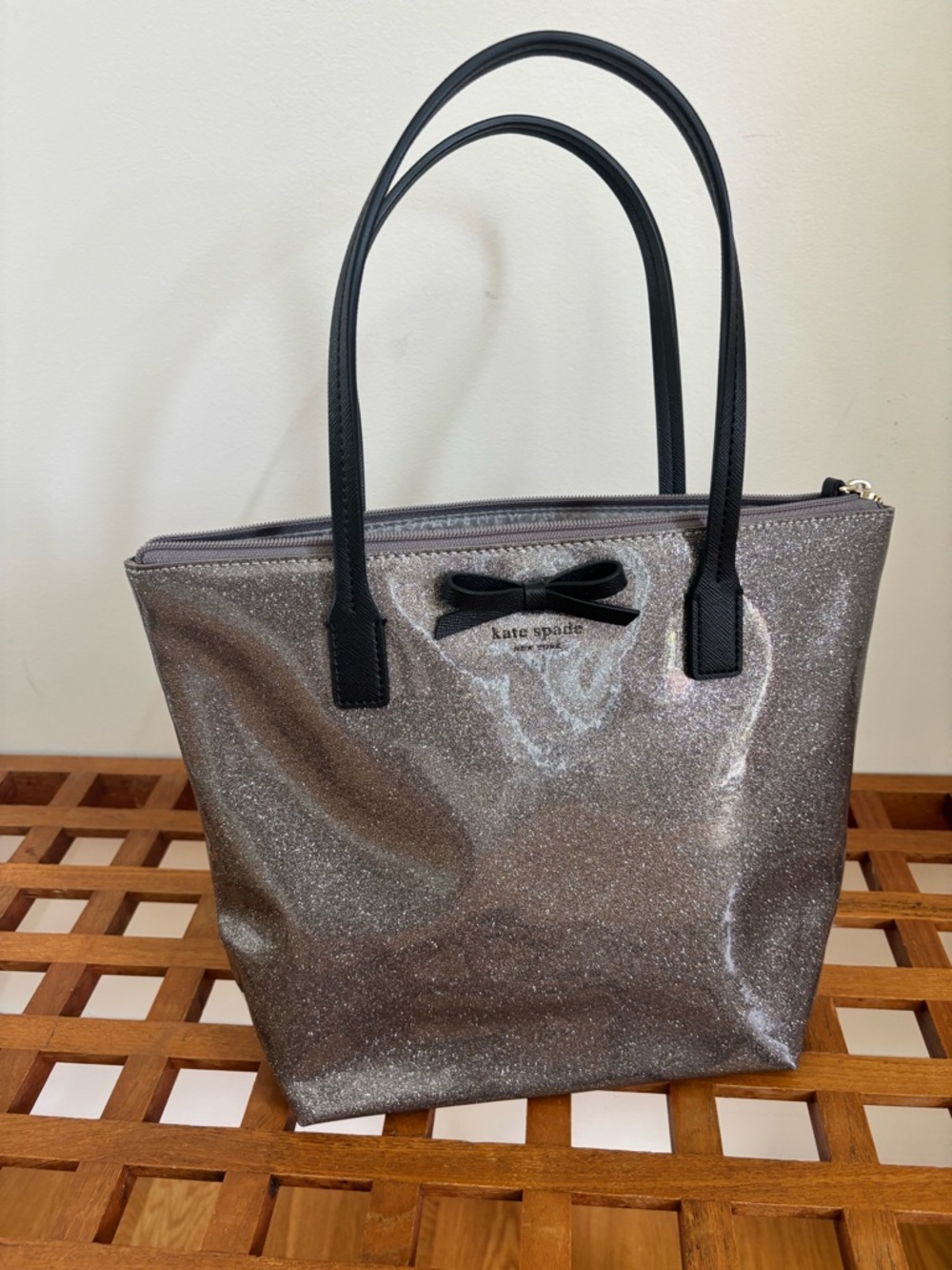 Pristine kate spade Silver Glitter Tote with Black Handles and Bow